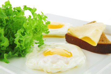 green lettuce and fried eggs