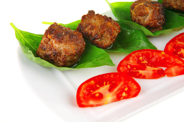 roasted beef cutlets on white