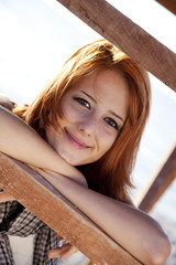 Portrait of beautiful red-haired girl