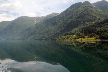 Fototapeta na wymiar Reflections in Fjaerlandsfjord, Norway