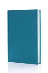 Isolated blank blue hardback book