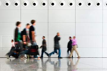 indoor walkway with blurred people