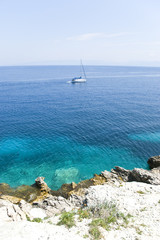 sailing boat on turquoise blue sea in Greece