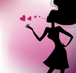 Beautiful girl silhouette with a hearts