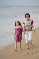 Grandmother And Granddaughter At Seashore, Maui, Hawaii, Usa