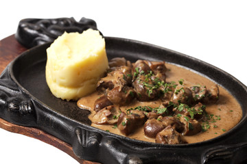 meat in the pan. isolated on a white background