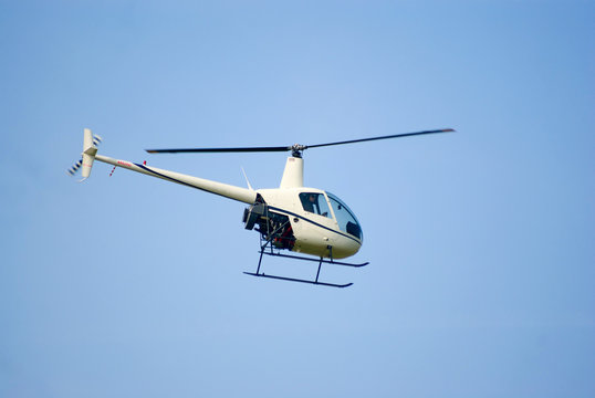 Robinson R-22 helicopter in the air