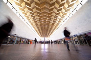 People in train station