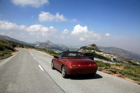Sport car cabriolet across Sierra Nevada in Spain