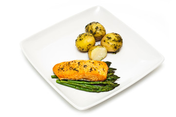 salmon and asparagus served with potatoes