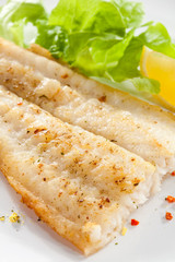 Fish dish - fried fish fillet with vegetables