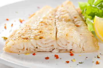 Fish dish - fried fish fillet with vegetables