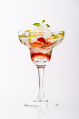 exotic vanilla ice cream with fruits served in margarita glass