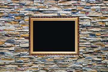 the bright ornamental stone wall with old style wodden frame wit