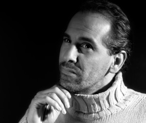 Adult man portrait thinking expression on black and white