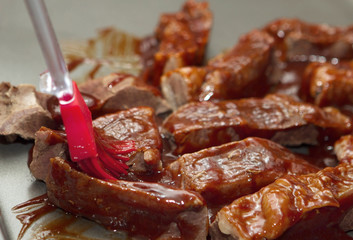applying bbq sauce