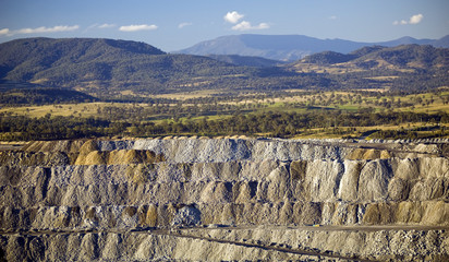 Open cut mining walls of overburden in a huge coal mine