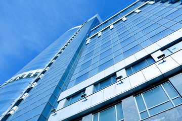 Fototapeta na wymiar perspective view to blue business glass modern panoramic skyscra