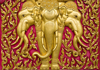 elephant carved gold paint on church door