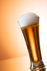 Beer glasses against the colorful gradient background