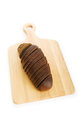 Bread and cutting board isolated on white