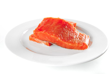 fresh smoked salmon on white plate