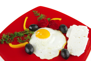 fried egg on red dish
