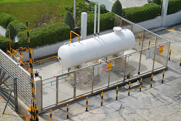 Liquid Petroleum Gas (LPG) storage unit inside a security fence - obrazy, fototapety, plakaty