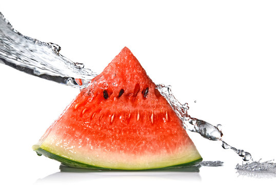 watermelon and water splash isolated on white