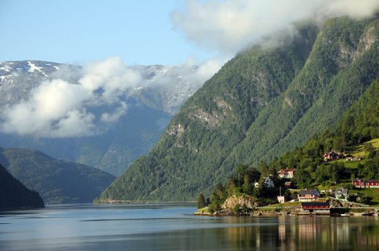 Morning mist on Hardangerfjord at Ulvik, Norway
