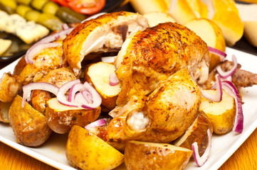 baked chicken and potatoes