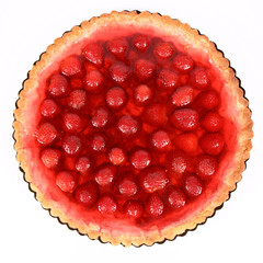 Strawberry Tart in a tart pan on a white background