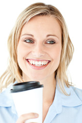 Delighted businesswoman holding a cup of coffee