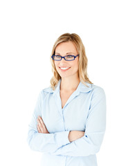 Confident businesswoman with folded arms smiling at the camera