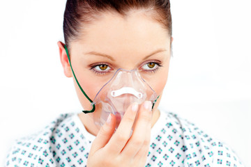 Female patient with an oxygen mask