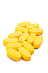 yellow vitamin pills