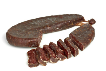 Piece of turkic summer sausage (Sucuk)  and few slices