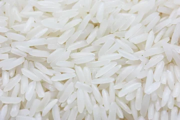 Gordijnen Close-up of grains of jasmine rice © uckyo