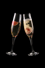 glass of champagne with strawberry