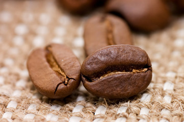 Brown coffee grains on a sacking