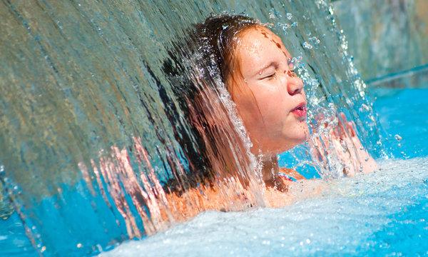 Tween Girl Cools Off In Pool