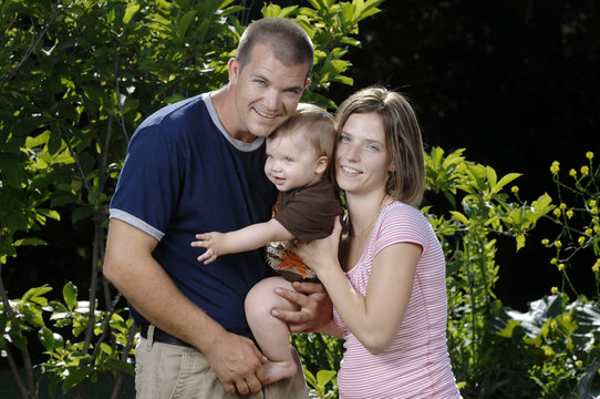 Young happy family playing