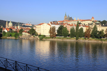 The View on summer Prague above River Vltava with  gothic Castle