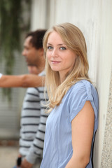 Closeup of happy student standing outside