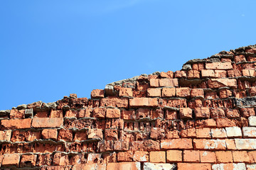 aging brick wall on celestial background