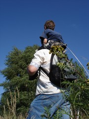 Huckepack (little boy piggyback on daddy)