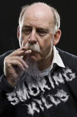 Man with cigar and smoking kills text in smoke