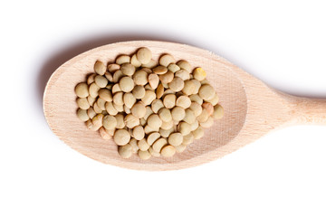 lentil on wooden spoon