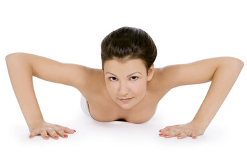 Obraz premium Cute woman lying on the floor isolated over a white