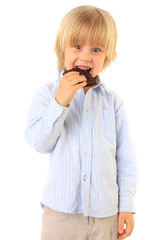 happy kid eating chocolate